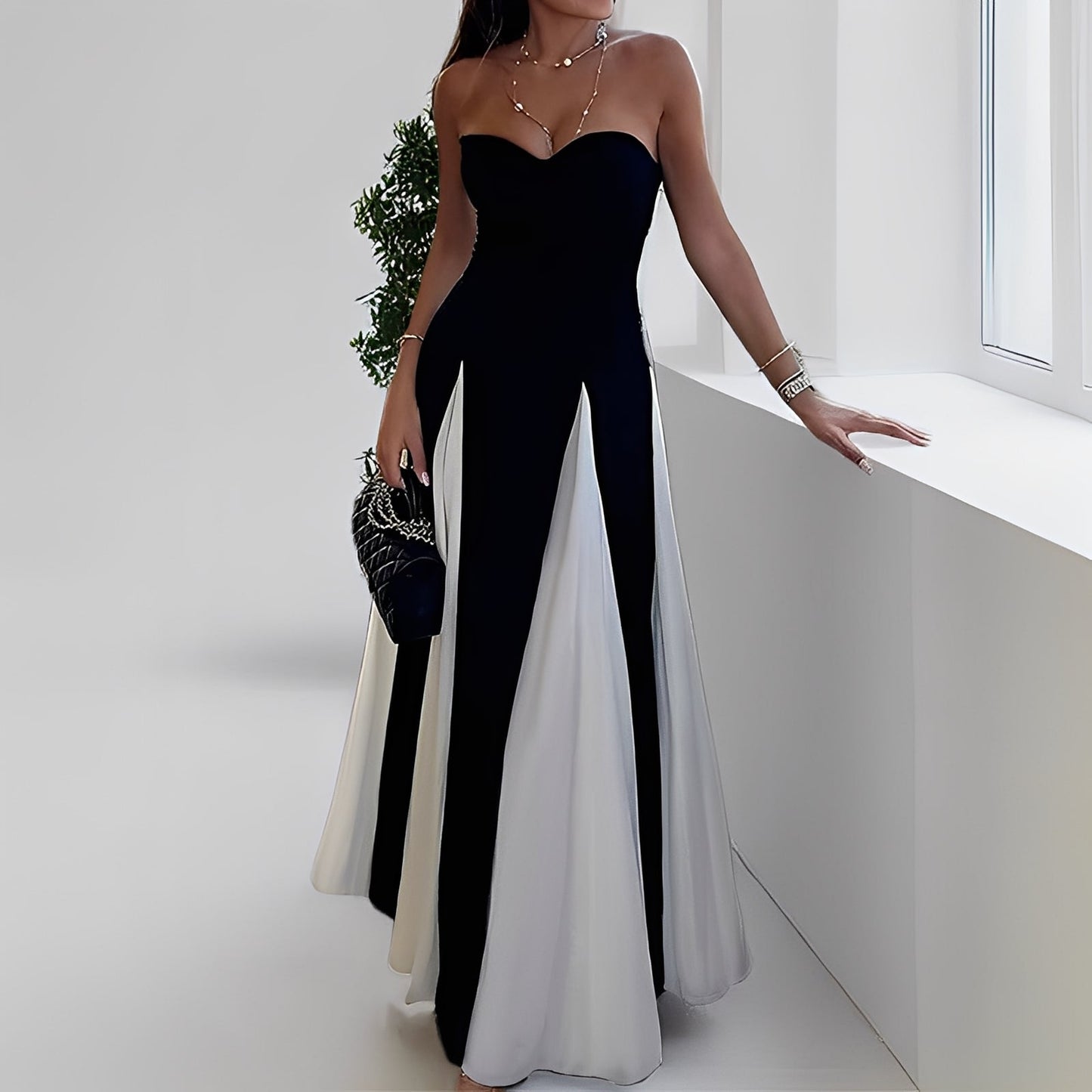 Charisse - Elegantti kontrastimekko, jossa on iso helma naisille