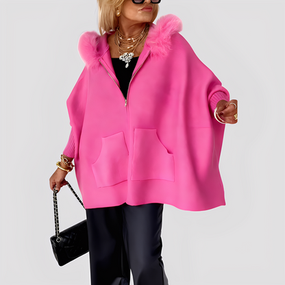 Elvena - Muotitietoinen tekoturkistakki hupulla naisille